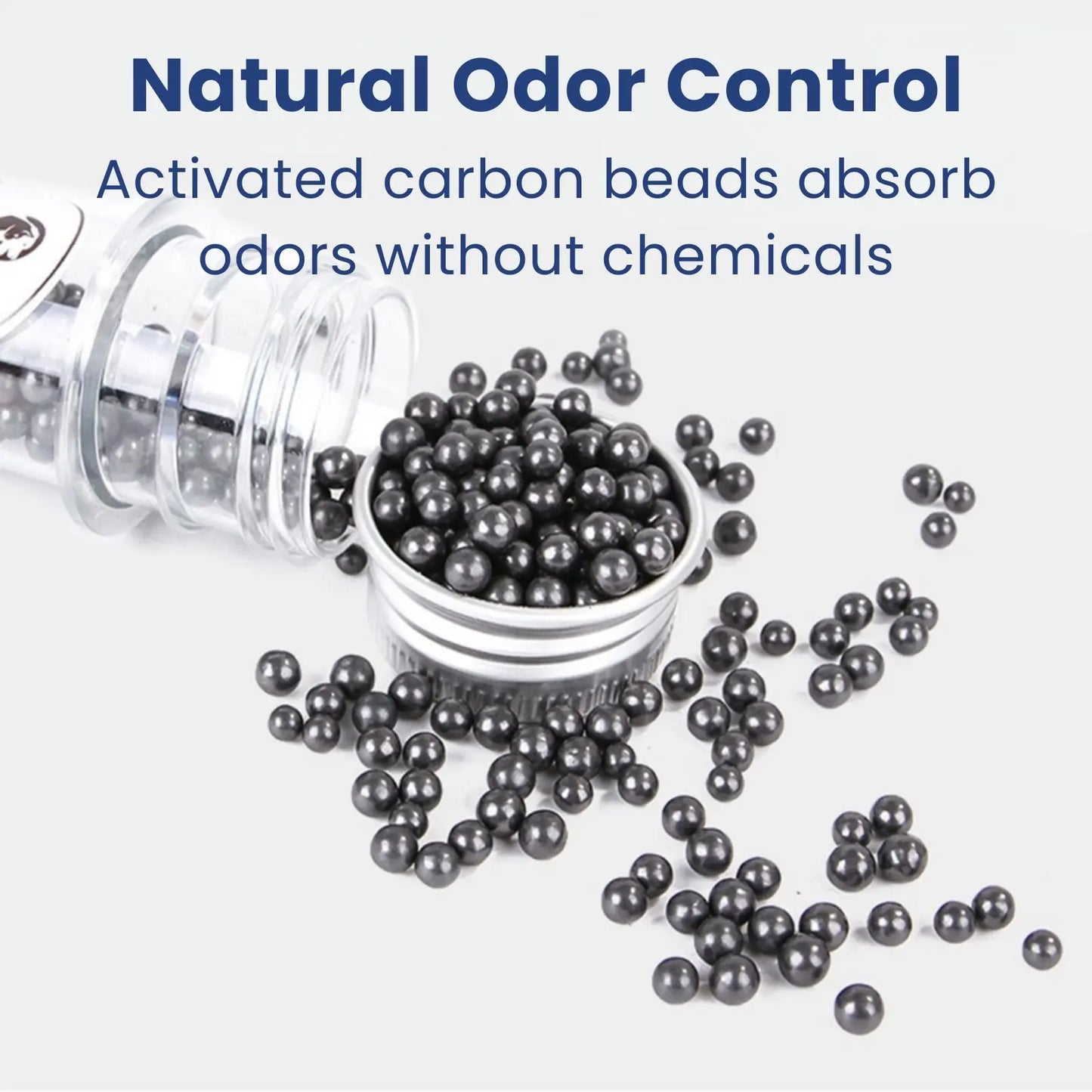 Activated carbon cat litter deodorizer beads poured from tube for odor control