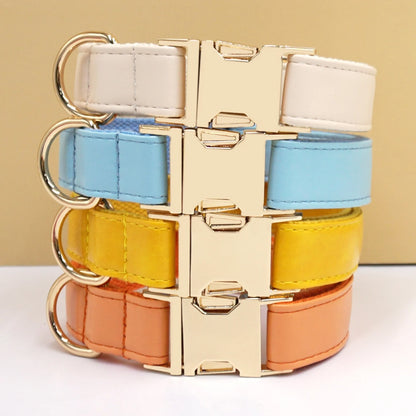 Stack of yellow, blue, and orange vivid leather dog collars