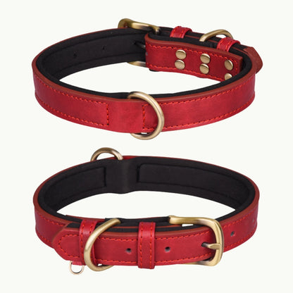 Red faux leather dog collar with black interior lining and bronze hardware, durable and adjustable design