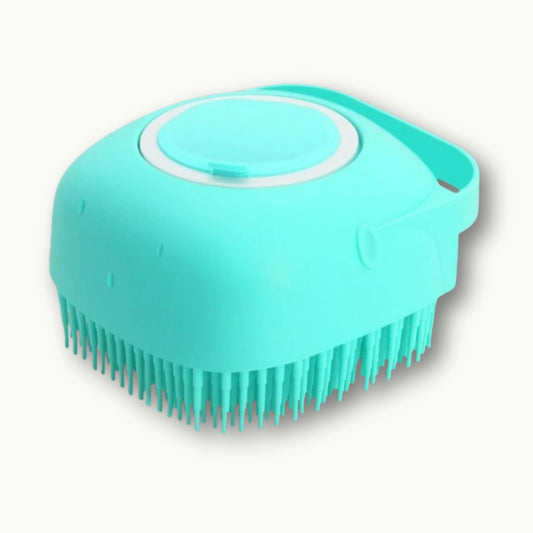 2-in-1 pet grooming brush in green with built-in shampoo dispenser
