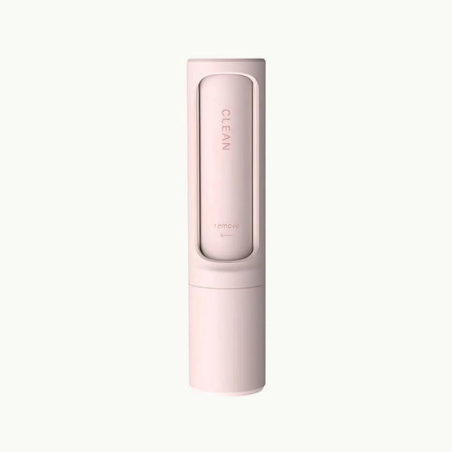 Pink FurSweep™ reusable pet hair remover brush, compact design
