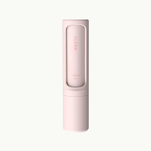 Pink FurSweep™ reusable pet hair remover brush, compact design