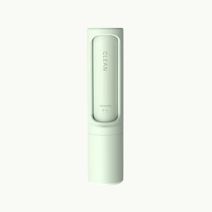 Green FurSweep™ reusable pet hair remover brush, modern design